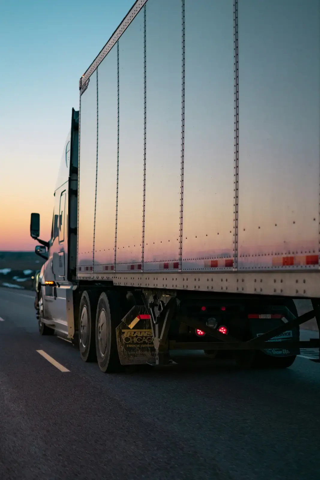 A freight truck on an open road