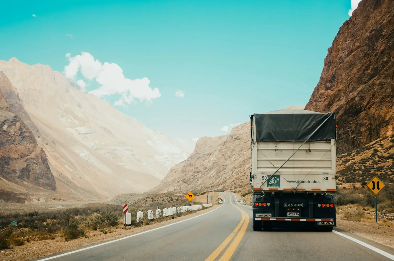 A truck on a hill country road